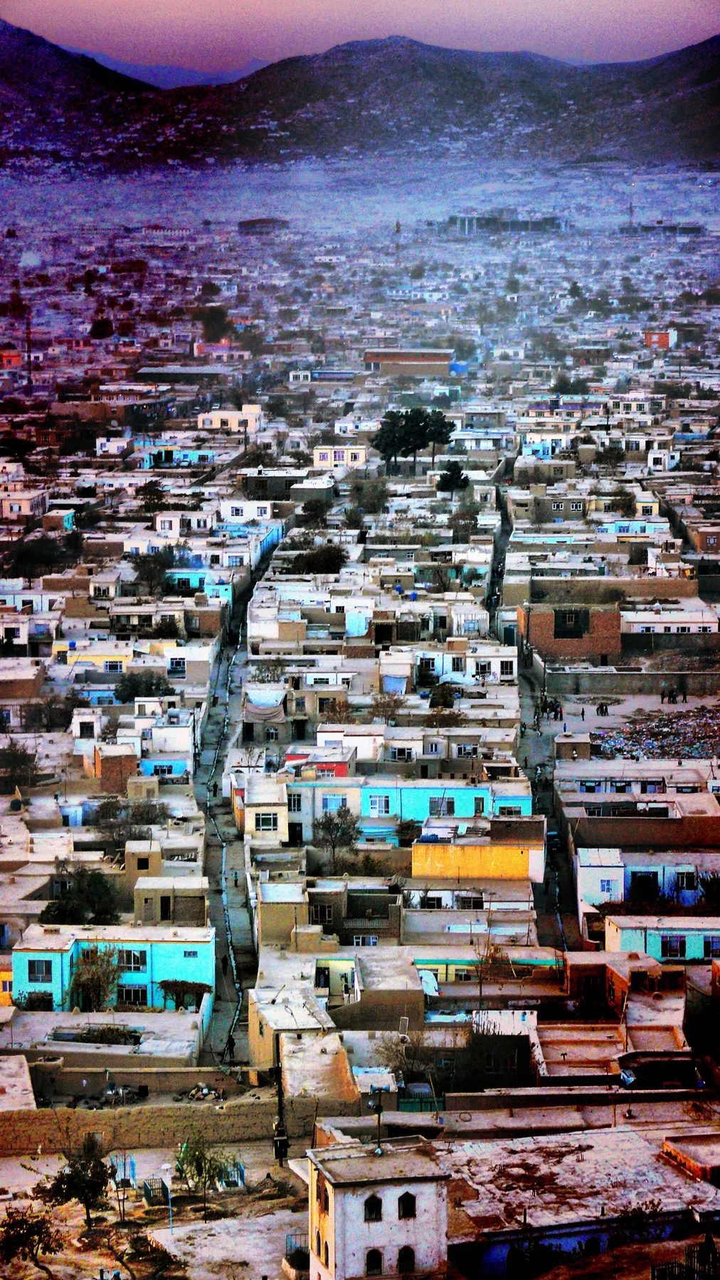 Kabul skyline at dusk, illustrating a complex operating environment